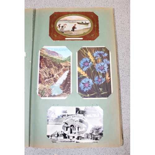 505 - Vintage postcard album and contents