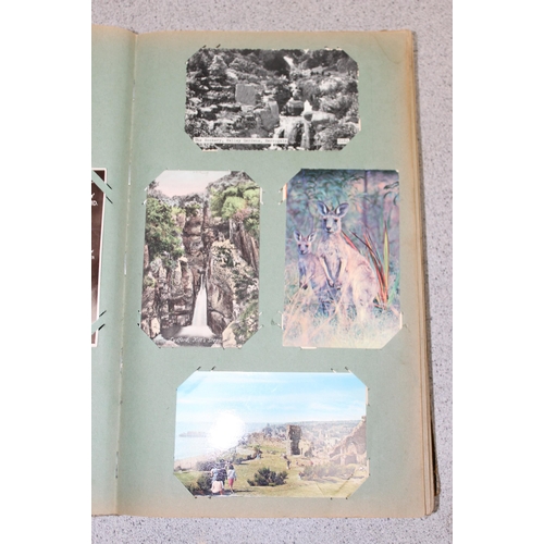 505 - Vintage postcard album and contents