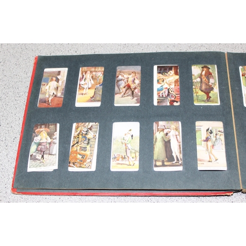 511 - Early 20c Wills cigarette card album containing four near but incomplete sets of Dandies, butterflie... 