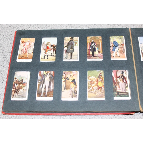 511 - Early 20c Wills cigarette card album containing four near but incomplete sets of Dandies, butterflie... 