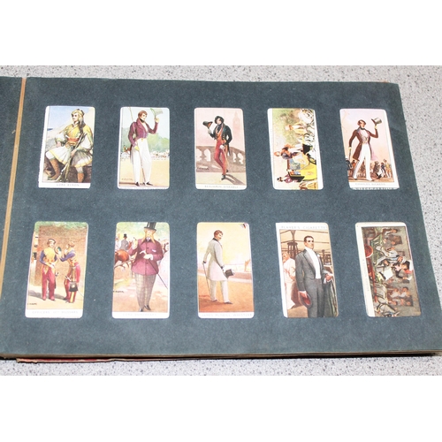 511 - Early 20c Wills cigarette card album containing four near but incomplete sets of Dandies, butterflie... 