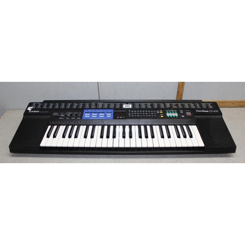 602 - Casio CT-470 keyboard with stand