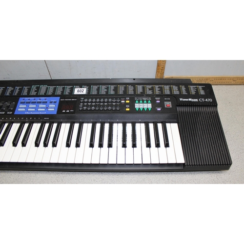 602 - Casio CT-470 keyboard with stand