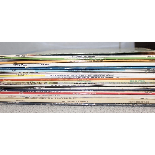 603 - Qty of vinyl records to incl Simon & Garfunkel, The Beatles, and Elton John