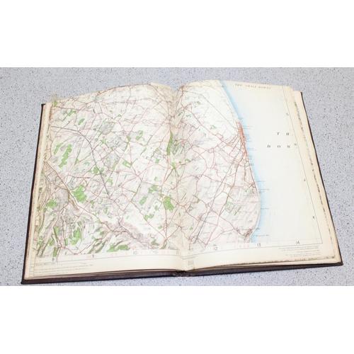 558 - Mixed lot of British maps to include an early 20th E.J Larby linen backed map titled 'through route ... 