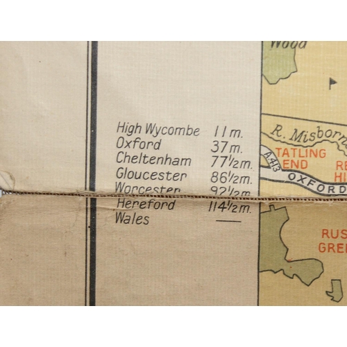 558 - Mixed lot of British maps to include an early 20th E.J Larby linen backed map titled 'through route ... 