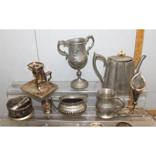 1039A - A large qty of assorted antique and later silver plated items to inc cutlery and a chamber stick, ap... 