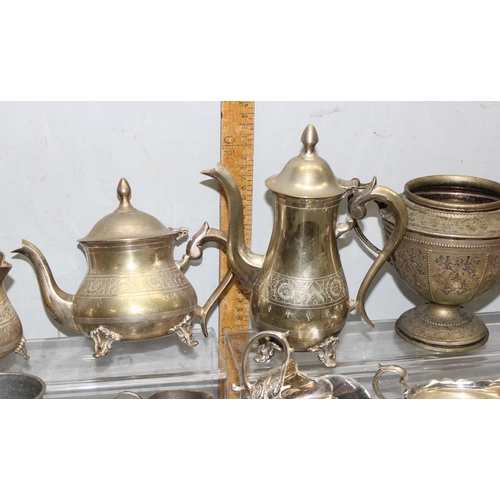 1064A - A large qty of assorted antique and later silver plated items and other metalware to inc 2 tea sets ... 