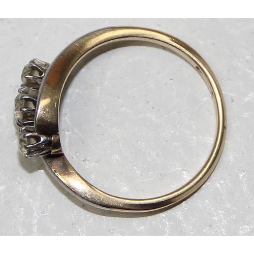 1154A - An antique 14ct gold ring with triple diamonds in crossover setting, mark rubbed but XRF confirmed a... 