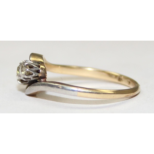 1154A - An antique 14ct gold ring with triple diamonds in crossover setting, mark rubbed but XRF confirmed a... 