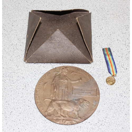 1431 - WW1 death penny or plaque named to Harold Charles Robinson, in original card case and a miniature WW... 