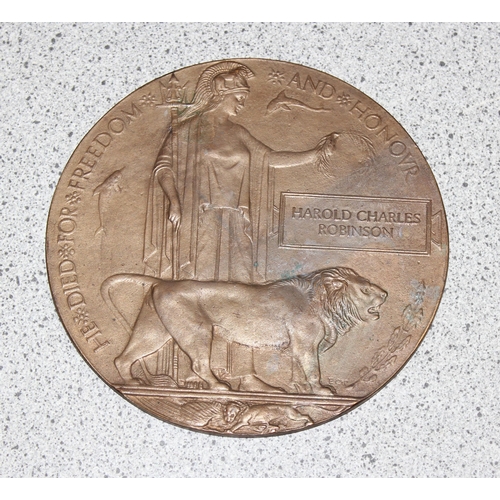 1431 - WW1 death penny or plaque named to Harold Charles Robinson, in original card case and a miniature WW... 