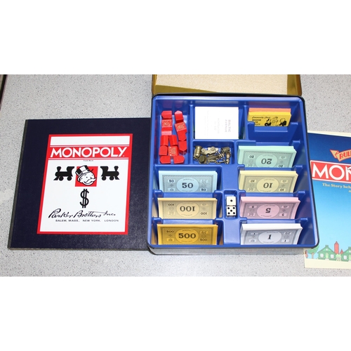 1534 - Vintage Monopoly set and a 1935 commemorative set in tin (2)