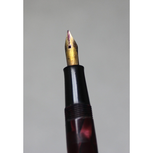 1632 - Qty of assorted fountain pens and other pens to inc a Conway Stewart 15 with red marbled finish with... 