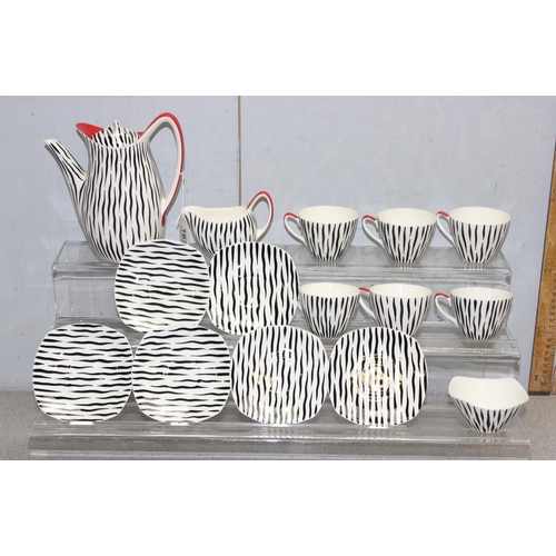 1636 - A rare Midwinter Modern Fashion Shape Zambezi pattern 6 person tea set with teapot, milk jug, and su... 