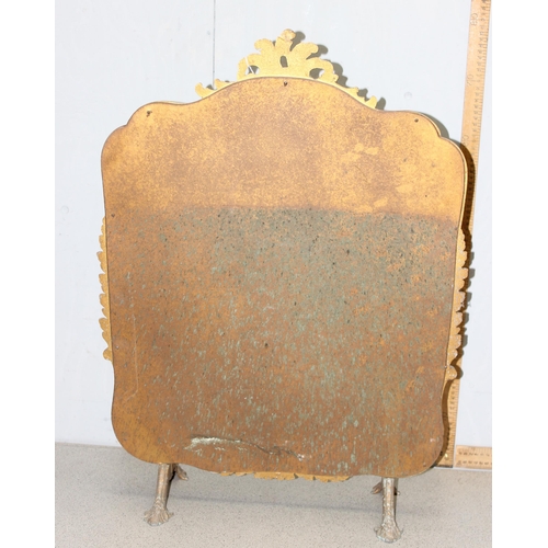 167 - A vintage gilt metal framed fire screen with floral print