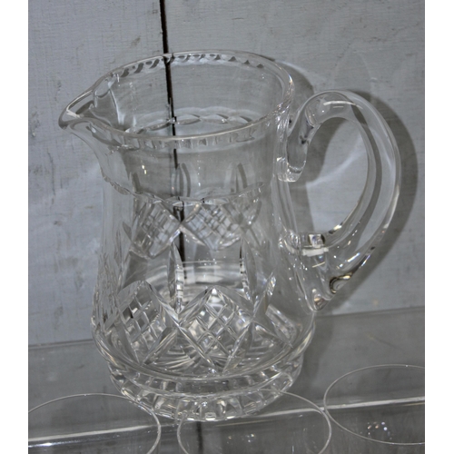 1780 - A set of 8 crystal whisky tumblers and a water jug, likely Stuart Crystal but seemingly unmarked