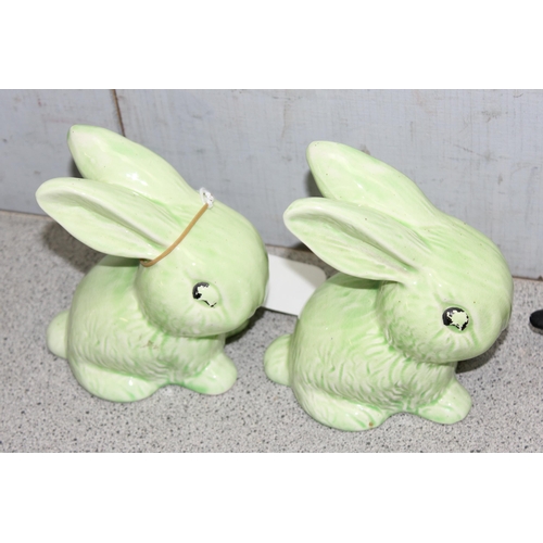 1783 - A pair of Art Deco period pottery rabbits with green glaze and 2 carved wooden Canadian Geese by Jam... 