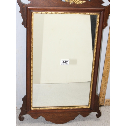 442 - A Georgian style wooden and gilt framed fretwork mirror with carved details, approx 70cm x 40cm