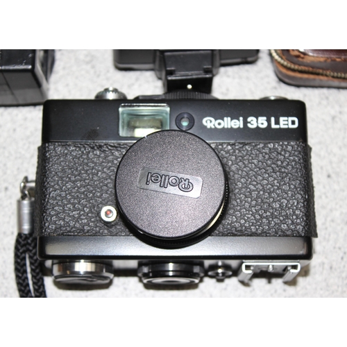 689 - A Rollei 35 LED camera with accessories