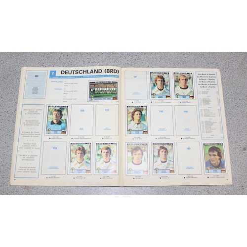 710 - A partially complete Panini World Cup 1978 sticker album, an AVA Football Special 79 album with some... 