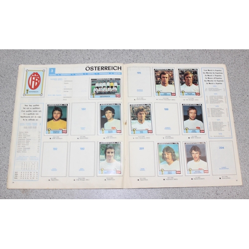 710 - A partially complete Panini World Cup 1978 sticker album, an AVA Football Special 79 album with some... 