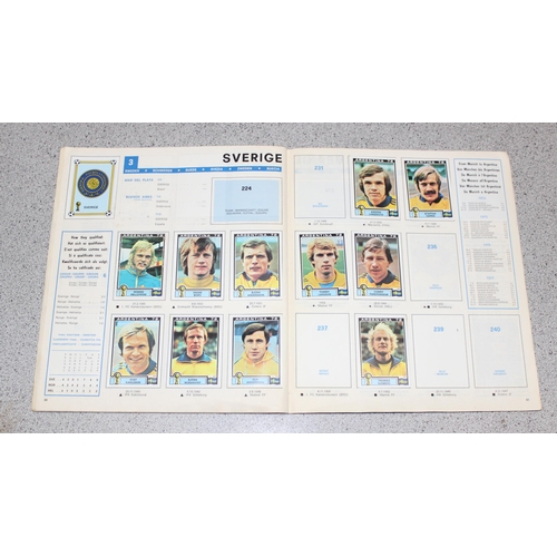 710 - A partially complete Panini World Cup 1978 sticker album, an AVA Football Special 79 album with some... 