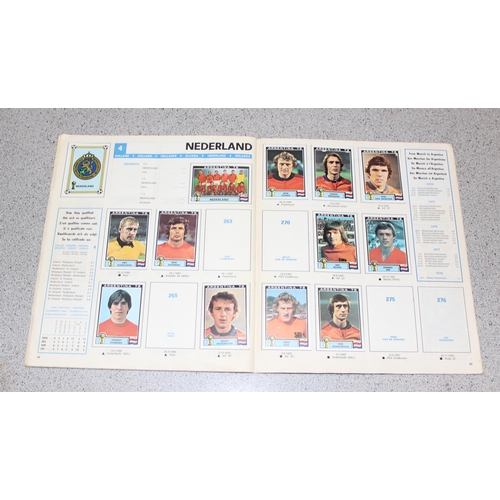 710 - A partially complete Panini World Cup 1978 sticker album, an AVA Football Special 79 album with some... 