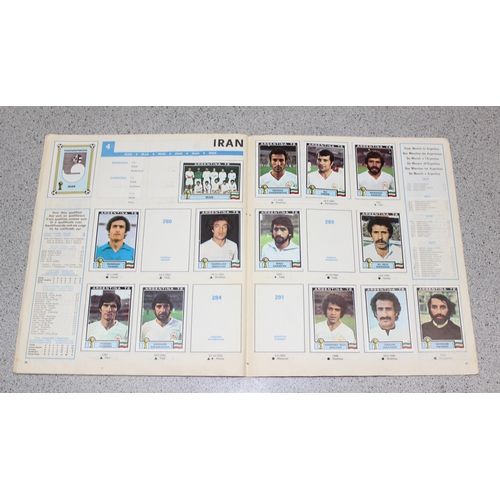 710 - A partially complete Panini World Cup 1978 sticker album, an AVA Football Special 79 album with some... 