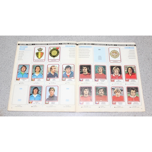 710 - A partially complete Panini World Cup 1978 sticker album, an AVA Football Special 79 album with some... 