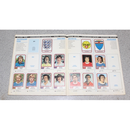 710 - A partially complete Panini World Cup 1978 sticker album, an AVA Football Special 79 album with some... 