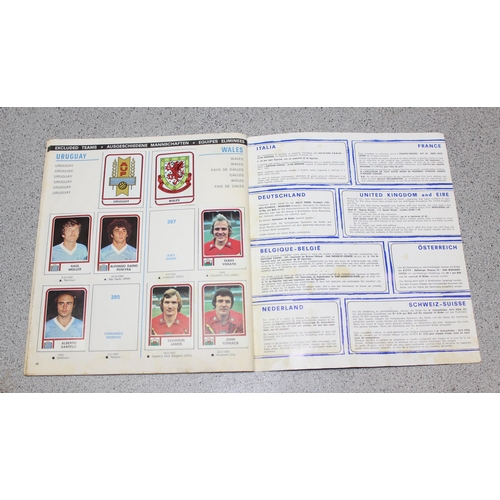 710 - A partially complete Panini World Cup 1978 sticker album, an AVA Football Special 79 album with some... 