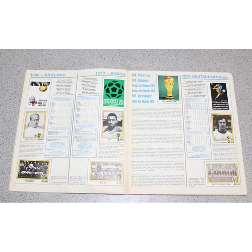 710 - A partially complete Panini World Cup 1978 sticker album, an AVA Football Special 79 album with some... 