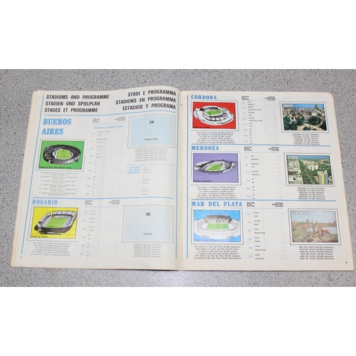 710 - A partially complete Panini World Cup 1978 sticker album, an AVA Football Special 79 album with some... 