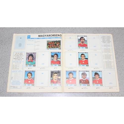 710 - A partially complete Panini World Cup 1978 sticker album, an AVA Football Special 79 album with some... 