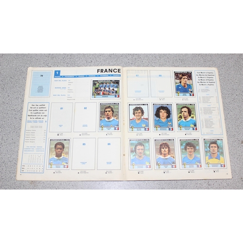 710 - A partially complete Panini World Cup 1978 sticker album, an AVA Football Special 79 album with some... 