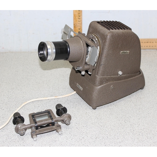 768 - 3 vintage projectors and other cinematic related items