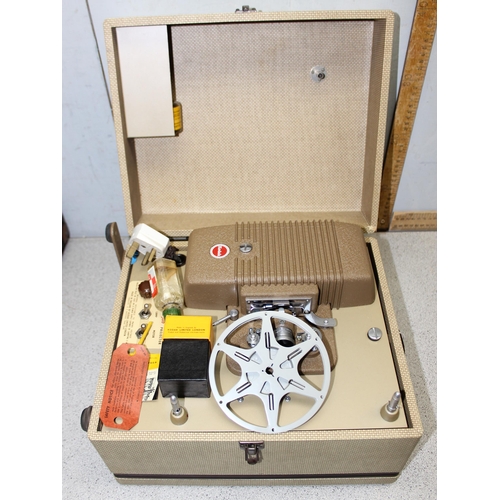 768 - 3 vintage projectors and other cinematic related items