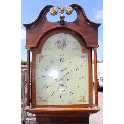 1317 - A 19th century mahogany longcase clock by W Helliwell, Leeds 1817-53, a break arch hand painted dial... 