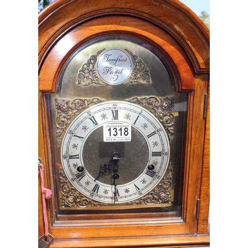 1318 - A 20th century walnut cased grandmother clock, the brass and silvered face with pierced spandrels, R... 