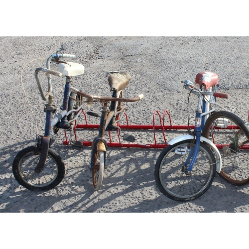 713 - 3 small children's bikes and a tricycle for parts