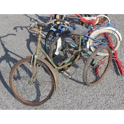 713 - 3 small children's bikes and a tricycle for parts