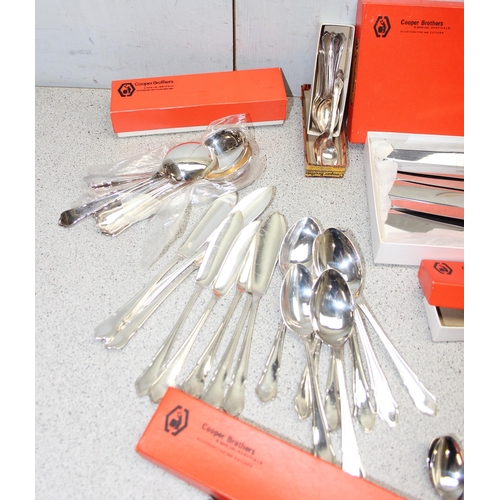 1012 - Large qty of Cooper Brothers 'Dubarry' pattern silver-plated cutlery, some in boxes, approx 5.5kg gr... 