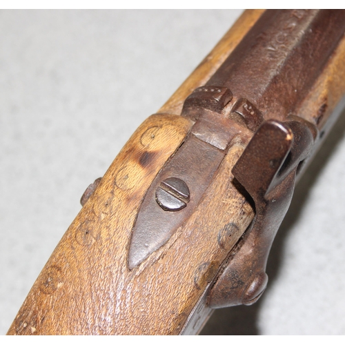 1408 - An antique percussion cap rifle with Tower lock dated 1863 lock, unusual hilt, believed to be North ... 