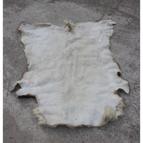 200 - Reindeer hide ground rug or throw, approx 145cm x 165cm