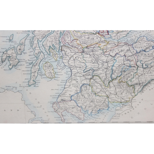 420 - An antique hand coloured map of the railways of Scotland, published by Edward Stanford, approx 58cm ... 