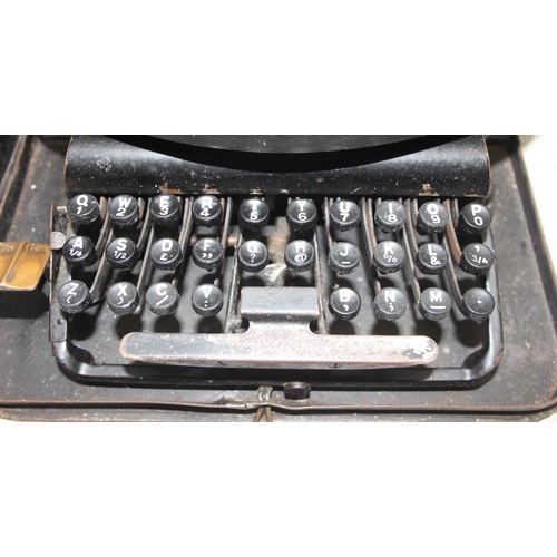 665 - Antique 'The Empire' typewriter in case