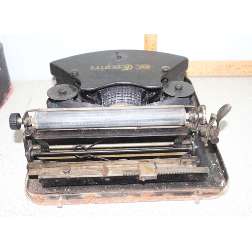 665 - Antique 'The Empire' typewriter in case