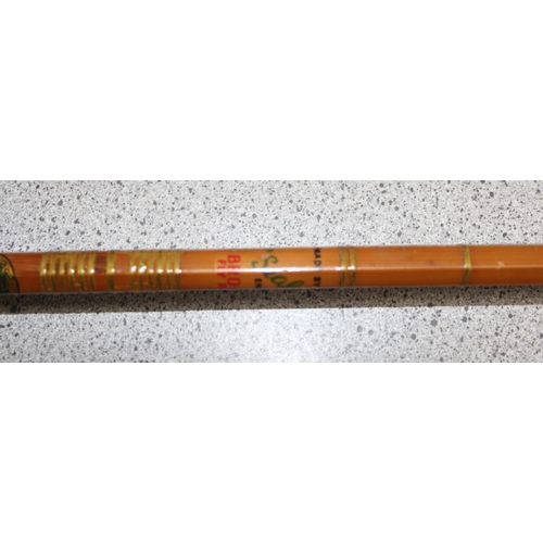 702 - 2 'Octopus' split-cane fly fishing rods by Sealey, with covers