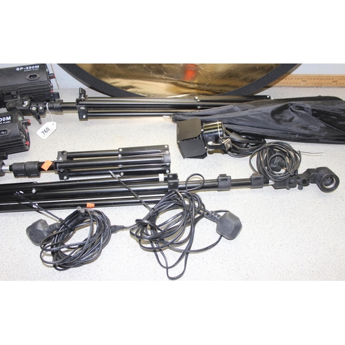 760 - Pair of Studio Flash lights, SP-300M, one other and a double sided light deflector